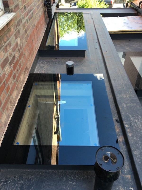 Multiple flat roof skylights on extension in Catford